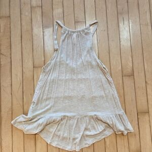 Cream Sleeveless Ruffle Hem Top